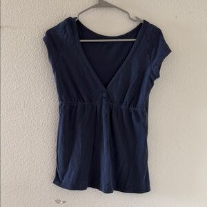 Brandy melville faded blue button top